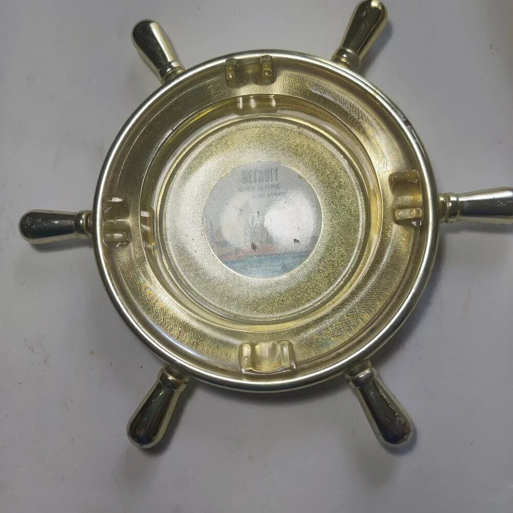Ships wheel Ashtray with Detroit Skyline from 1960''s. For decorative purposes.